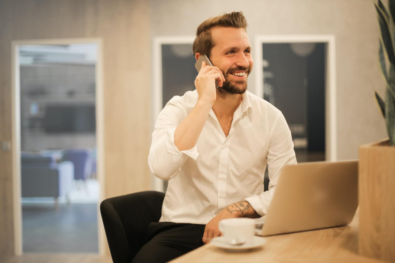 man making cold calls at work